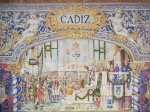 best tips for traveling to Cadiz Spain (photo of tiled mural in la Plaza de Espana in Sevilla)
