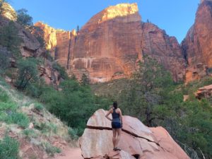 Kelly from Our Adventure Journal at the lower emerald pool zion national park
