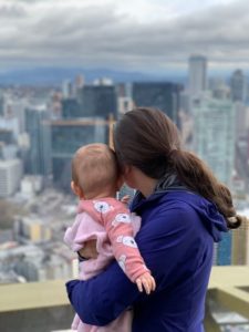Kelly from Our Adventure Journal and baby at the Space Needle
