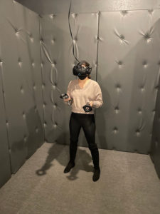 Kelly from Our Adventure Journal trying out virtual reality in Seattle