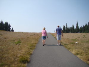 My mom and husband walking at Hurricane Ridge