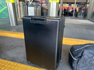 Large level8 suitcase being used at the airport